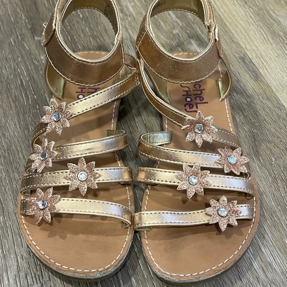 Rachel Gold Gladiator Sandals with Floral Accents